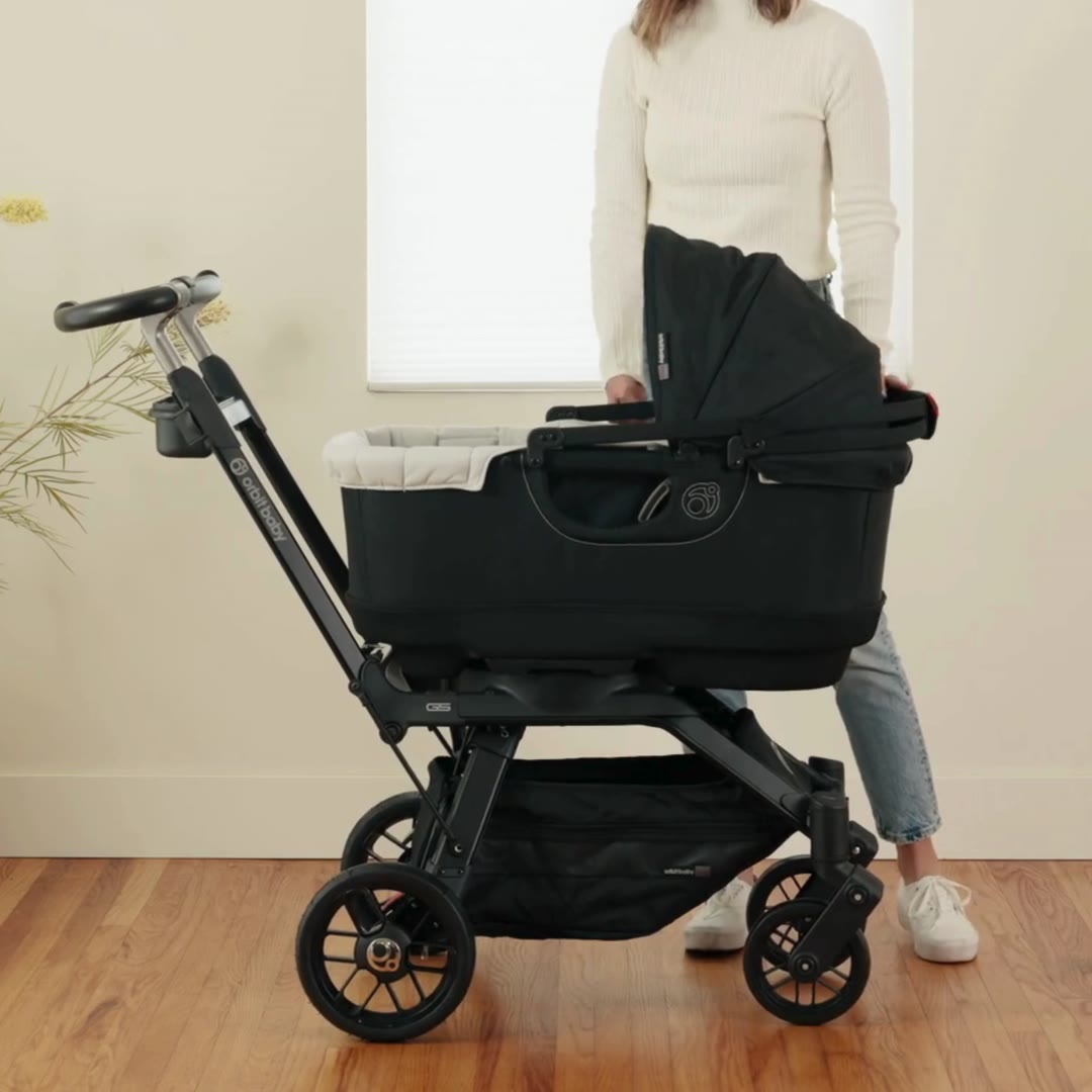 Orbit Baby Travel Bassinet docked on the G5 Stroller SmartHub