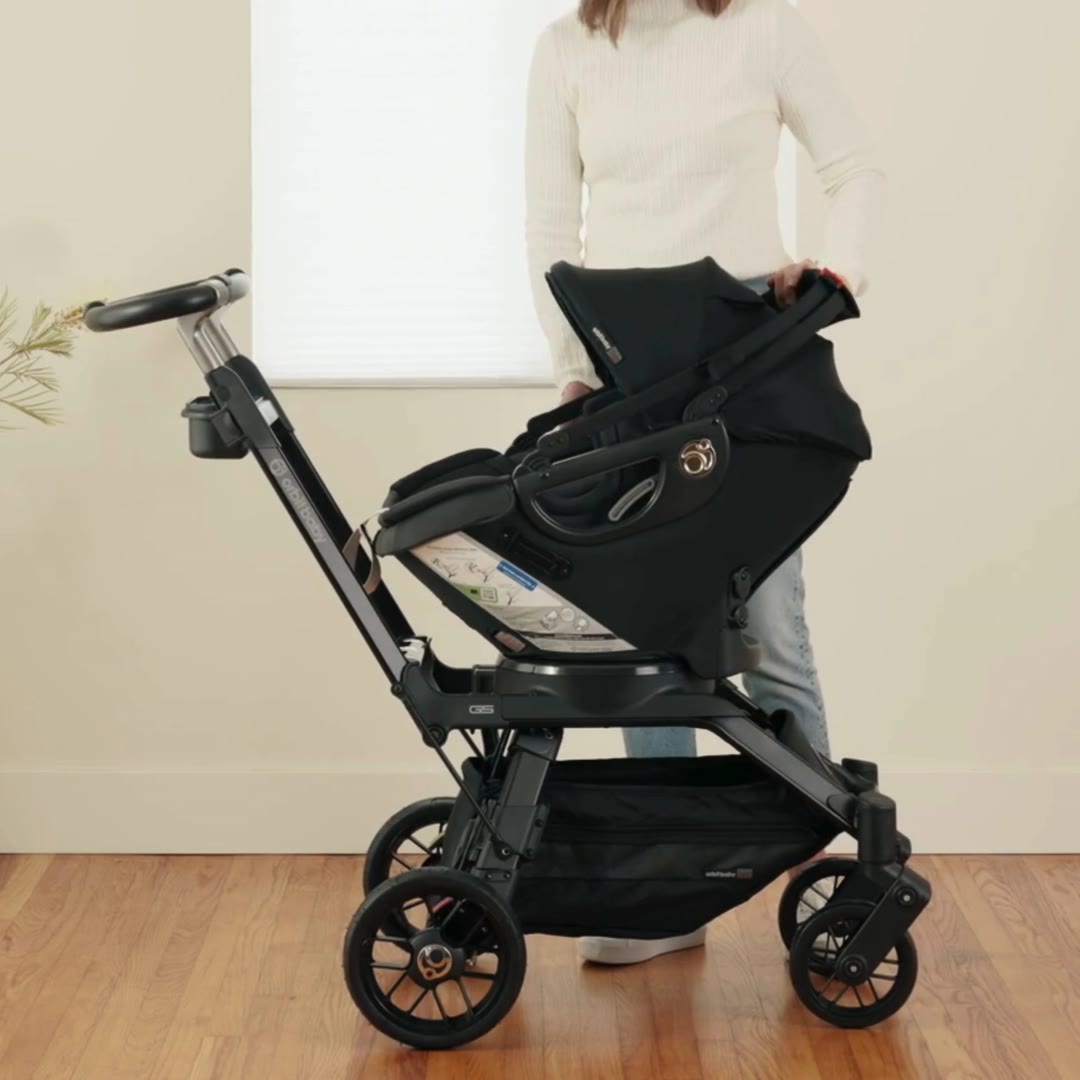 Orbit Baby Infant Car Seat docked on the G5 Stroller SmartHub