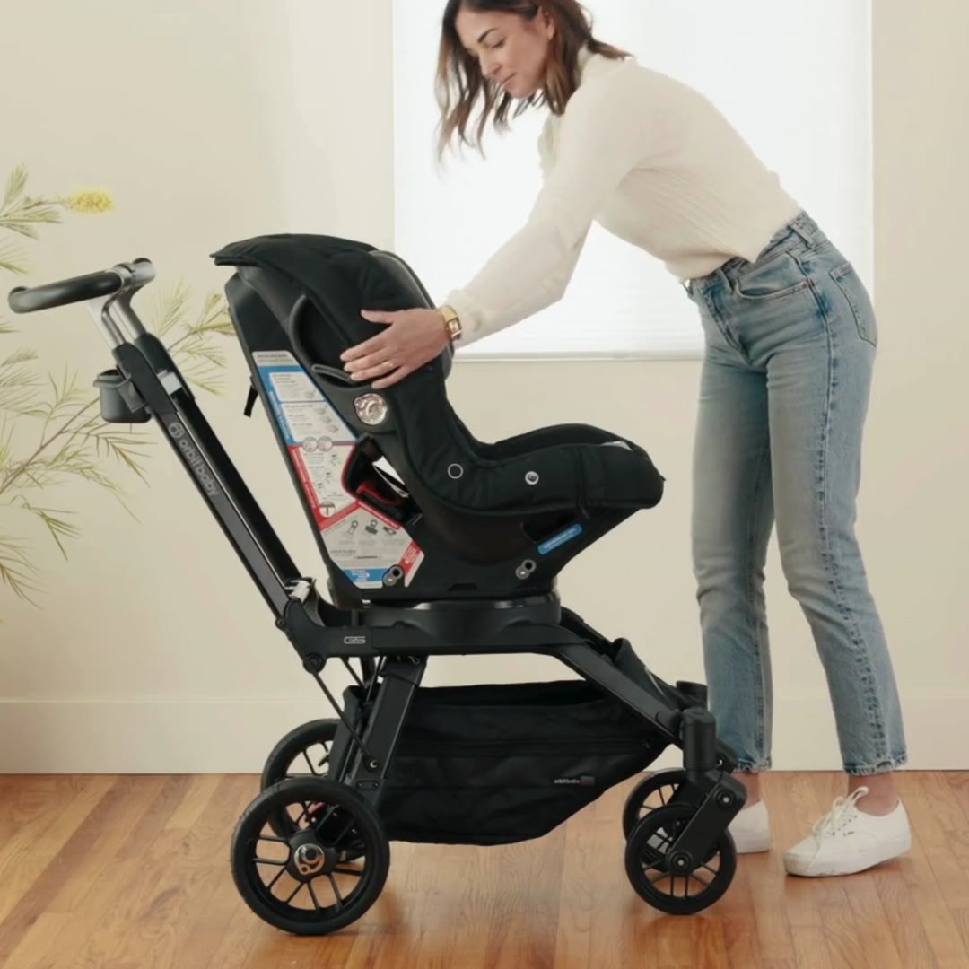 Orbit Baby Toddler Car Seat docked on the G5 Stroller SmartHub