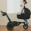 The Orbit Baby Travel Bassinet being docked onto the X5 Jogging Stroller SmartHub